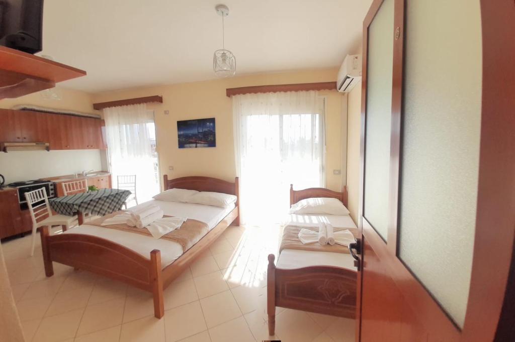 TV a/nebo společenská místnost v ubytování L&G Hotel
