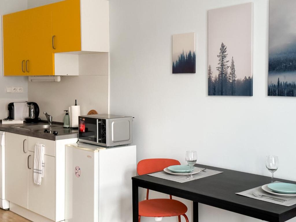 Kuchyň nebo kuchyňský kout v ubytování ELSO apartments