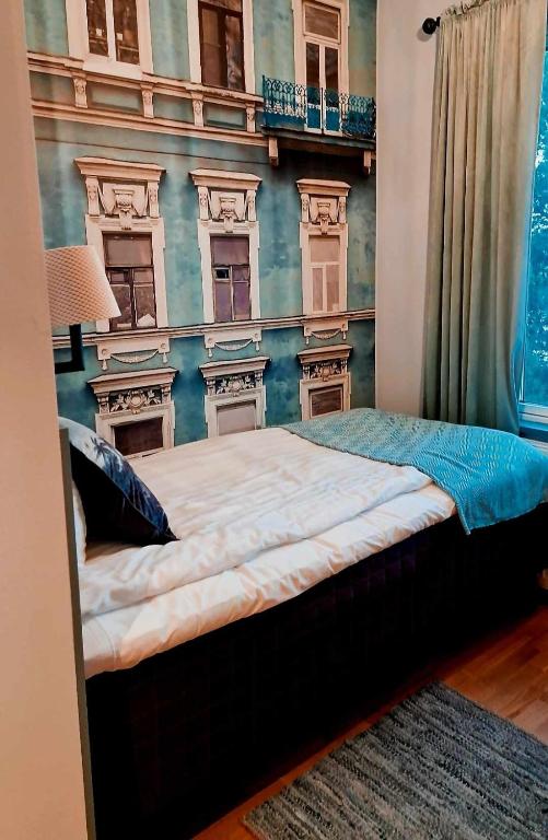 Postel nebo postele na pokoji v ubytování Edsbyns Hotell