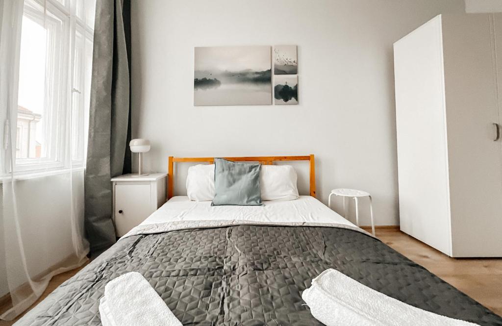Postel nebo postele na pokoji v ubytování ELSO apartments