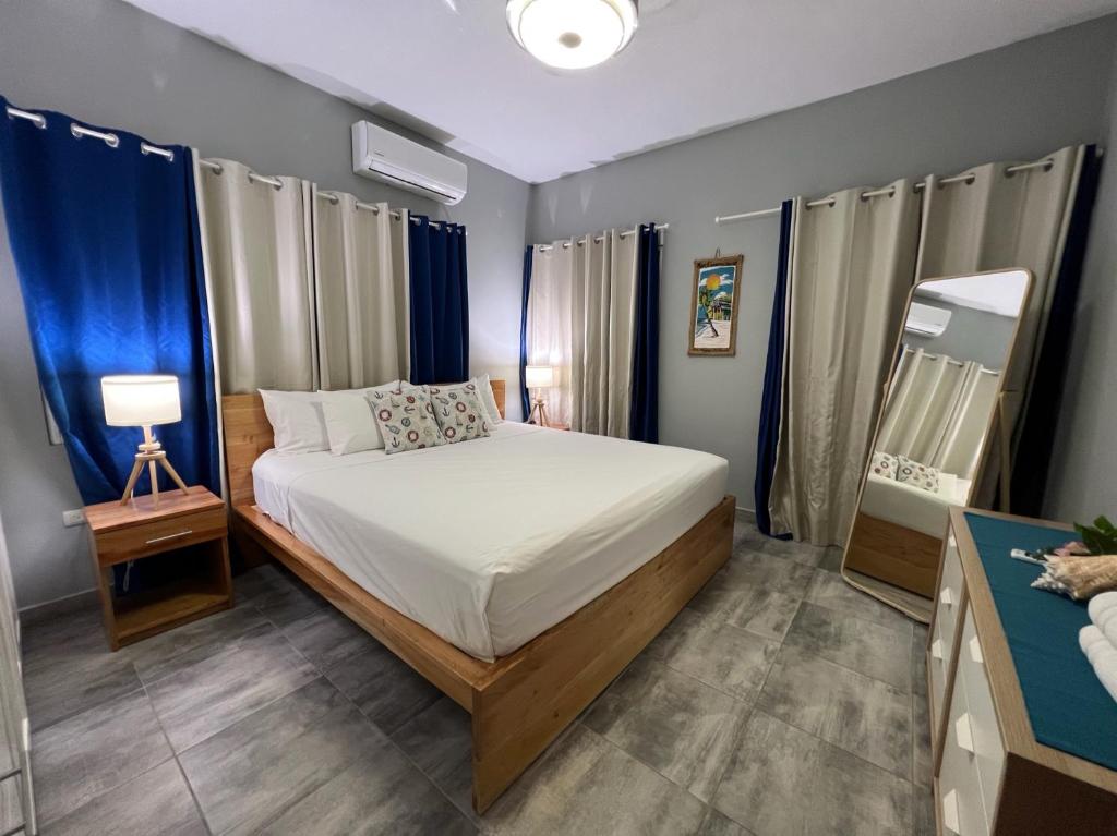 Postel nebo postele na pokoji v ubytování Casa Lambí
