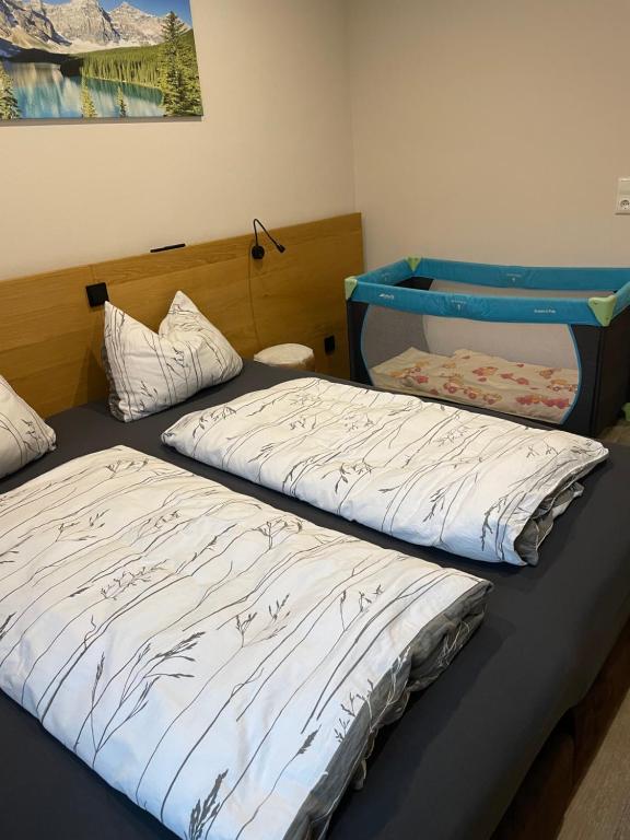 Postel nebo postele na pokoji v ubytování Schleo´s Apartments