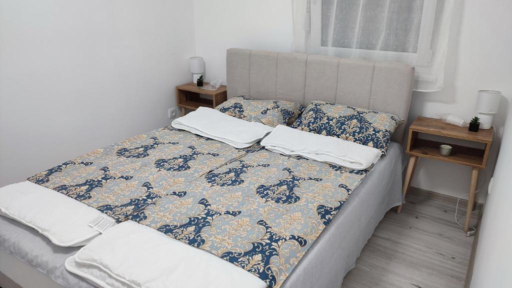 Postel nebo postele na pokoji v ubytování Apartman Bogdanovic