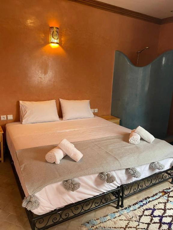 Postel nebo postele na pokoji v ubytování RIAD LAICHI