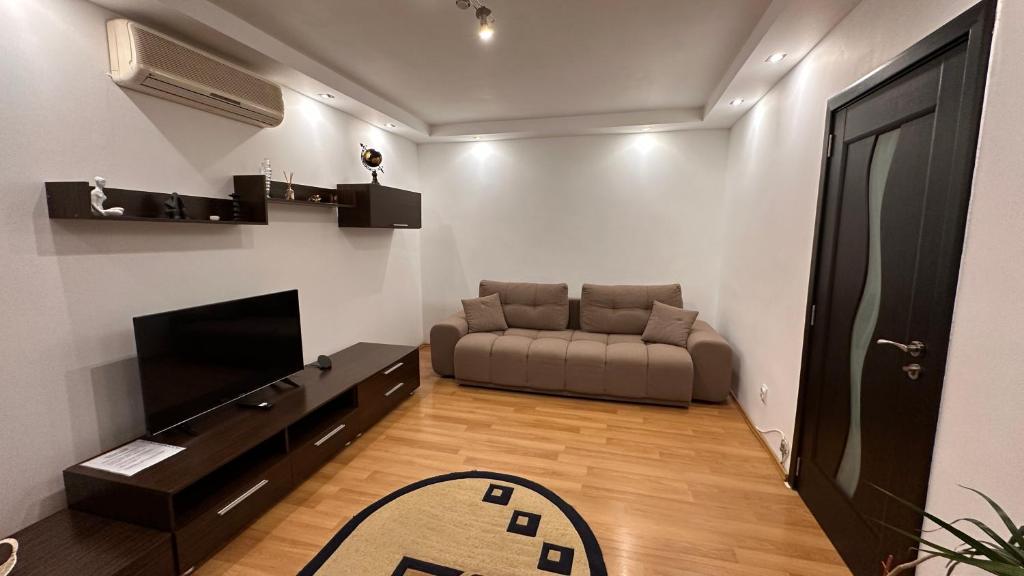 Χώρος καθιστικού στο Cozy flat near the city center