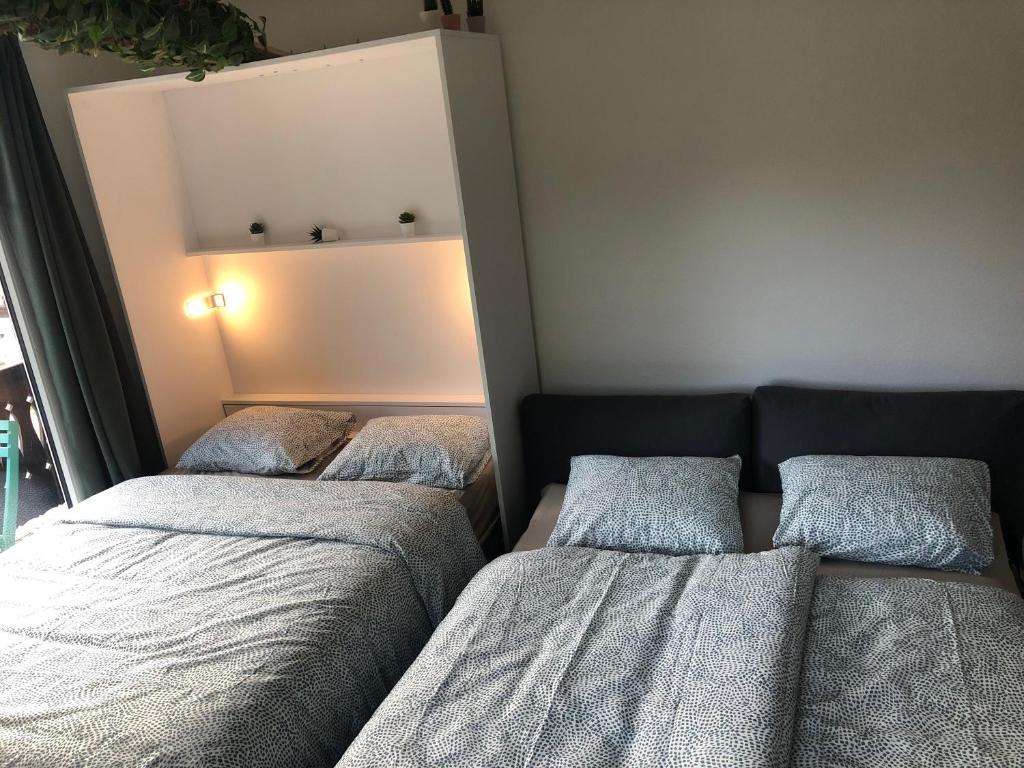 Letto o letti in una camera di Charmant studio idéalement situé