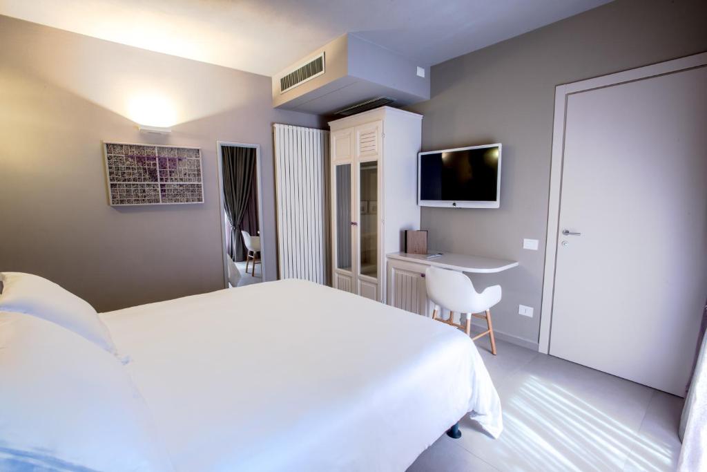 Televisor o centre d'entreteniment de Uve Rooms & Wine Bar