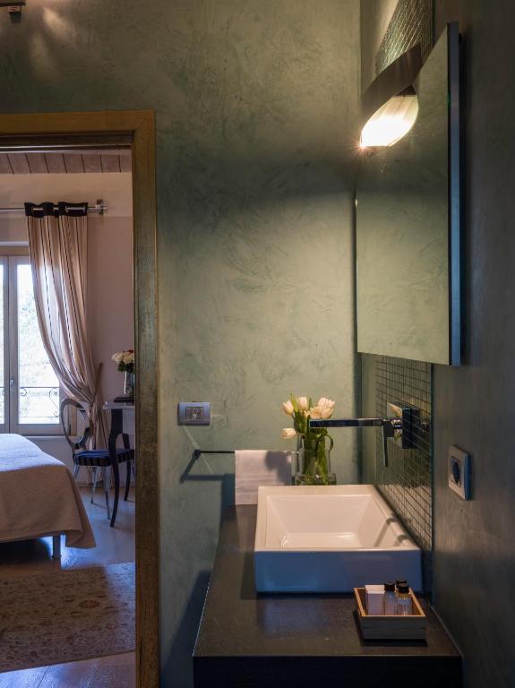 Postel nebo postele na pokoji v ubytování Hotel Residenza la Ceramica
