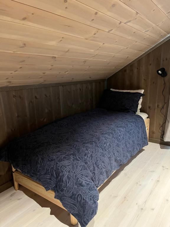 Postel nebo postele na pokoji v ubytování Polaren by Norgesbooking - cabin with amazing view