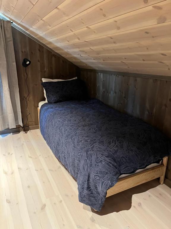 Postel nebo postele na pokoji v ubytování Polaren by Norgesbooking - cabin with amazing view