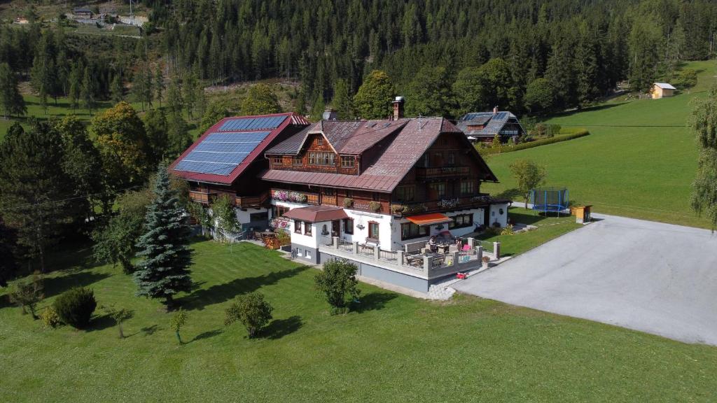 an overhead view of a house with solar panels on it at Schütterhof in Ramsau am Dachstein