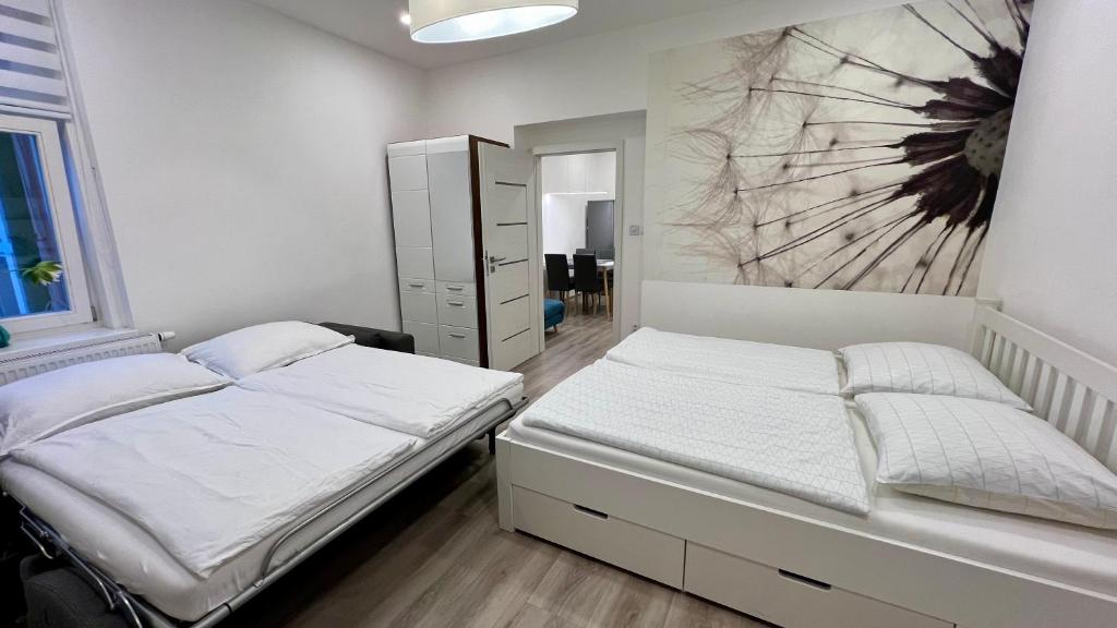 Postel nebo postele na pokoji v ubytování Ella Appartement