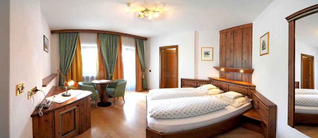 Postel nebo postele na pokoji v ubytování Hotel Teresa