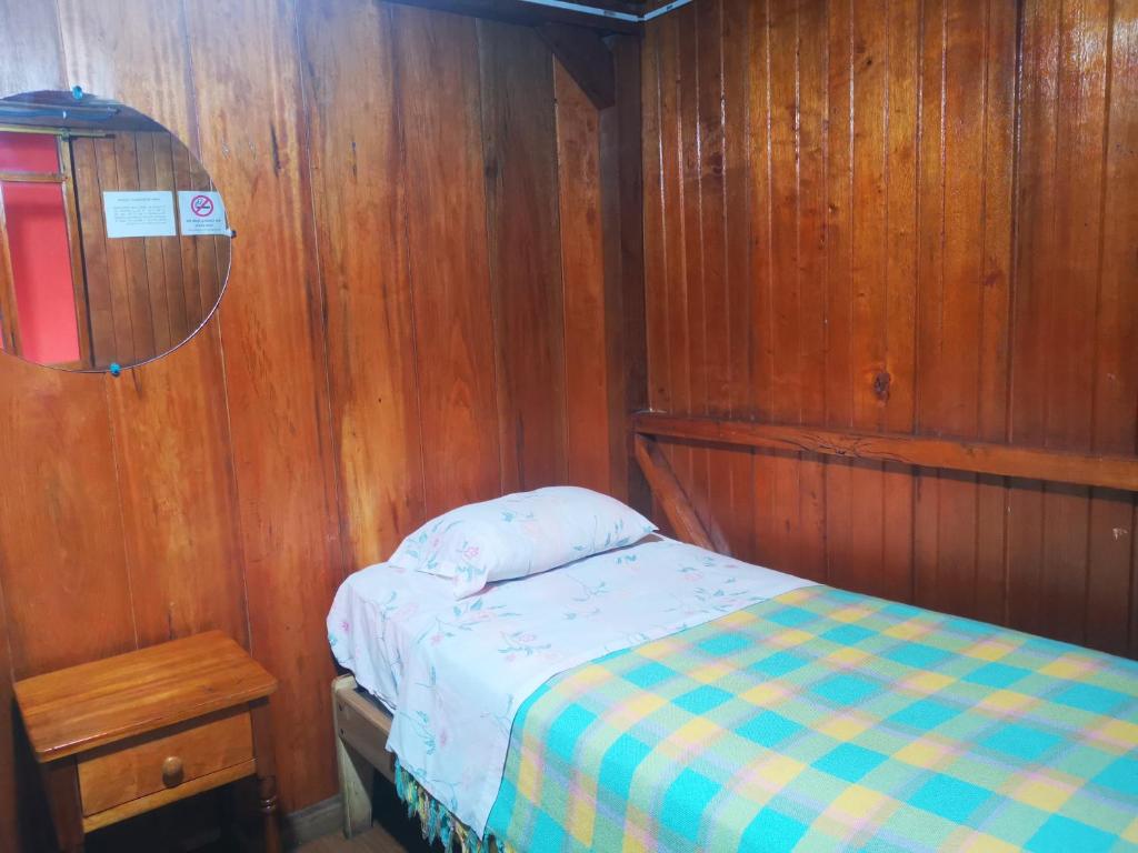 Postel nebo postele na pokoji v ubytování LA TRANQUILIDAD