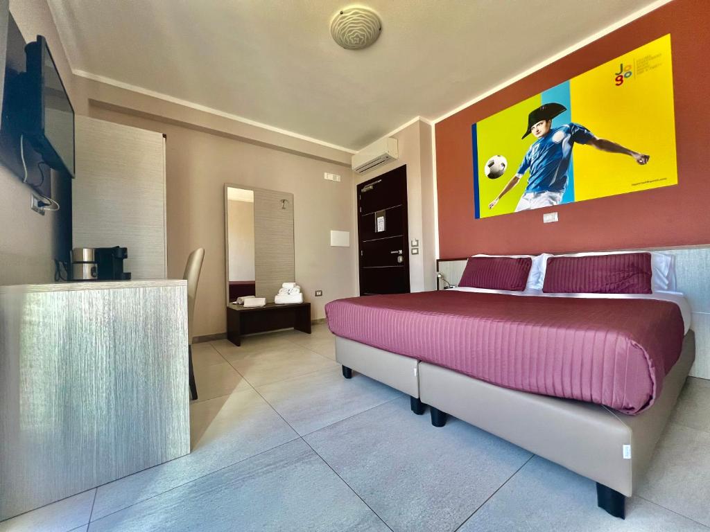 Postel nebo postele na pokoji v ubytování Jogo Rooms