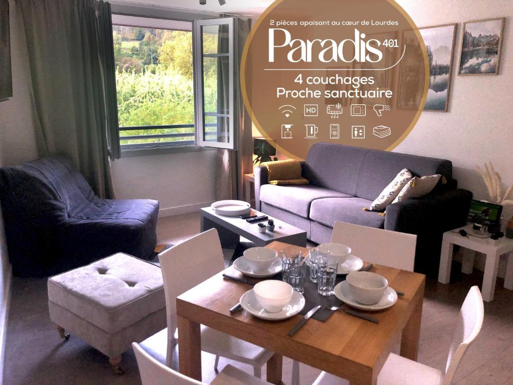 a living room with a table and a couch at [Paradis 401] T2 apaisant au coeur de Lourdes in Lourdes