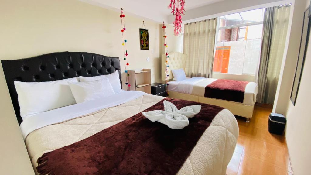 Rúm í herbergi á Hotel Valle Andino