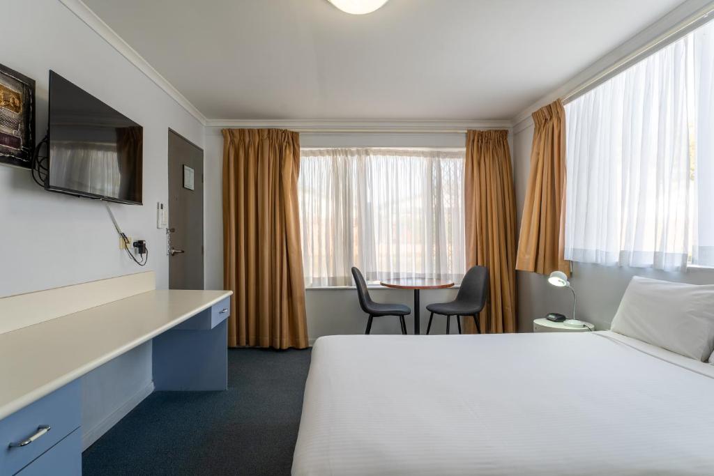Postel nebo postele na pokoji v ubytování Port Aloha Motel