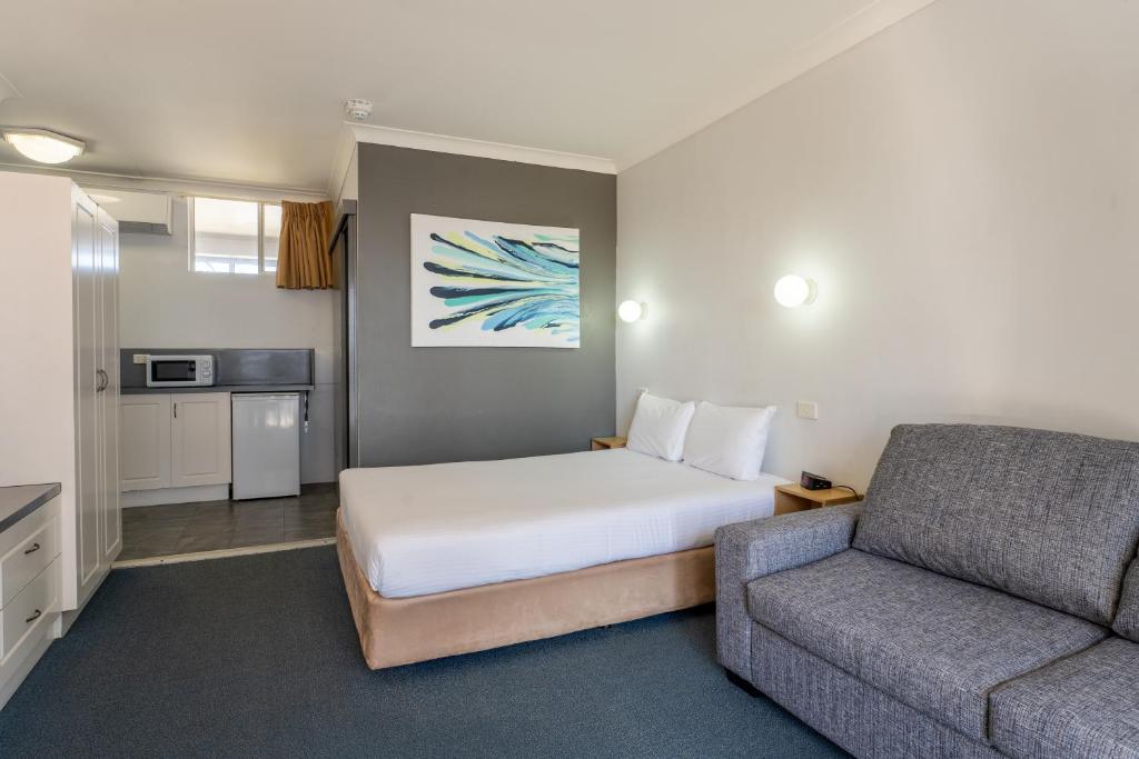 Kuchyň nebo kuchyňský kout v ubytování Port Aloha Motel