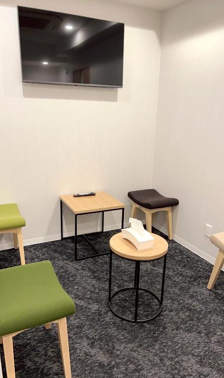 TV a/nebo společenská místnost v ubytování 難波ゲストハウスjakotelplus 難波店