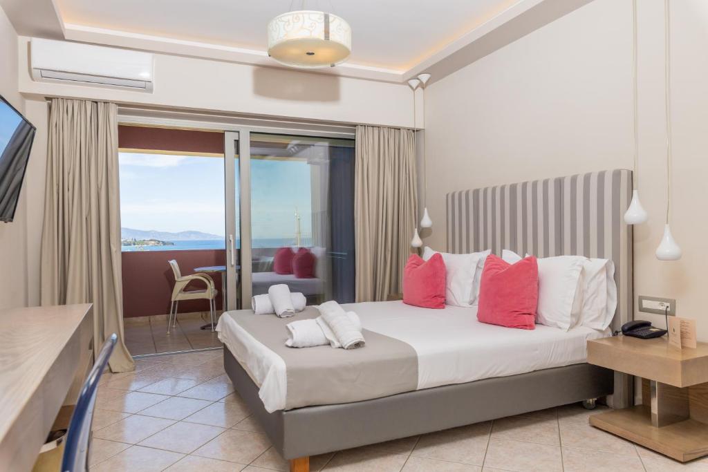 Postel nebo postele na pokoji v ubytování Balcony Boutique Hotel