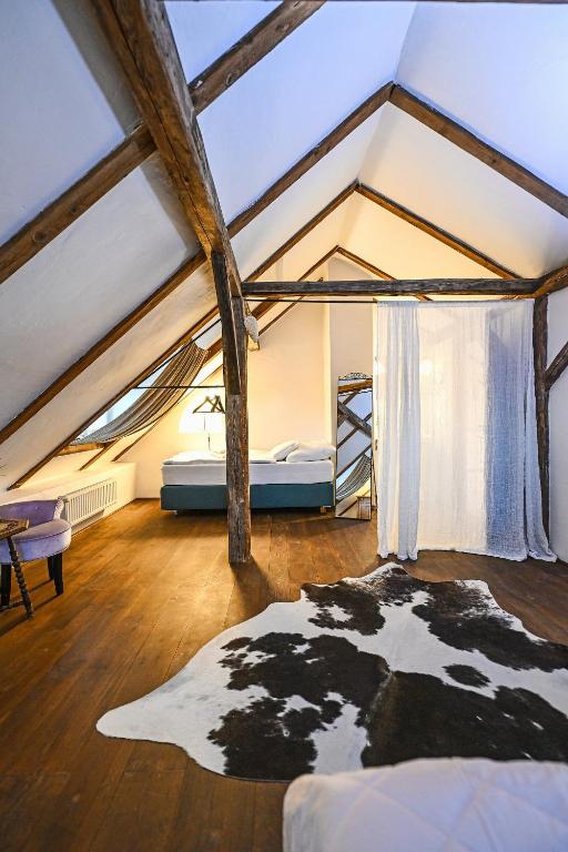 Postel nebo postele na pokoji v ubytování Boutique Apartman Mikulov