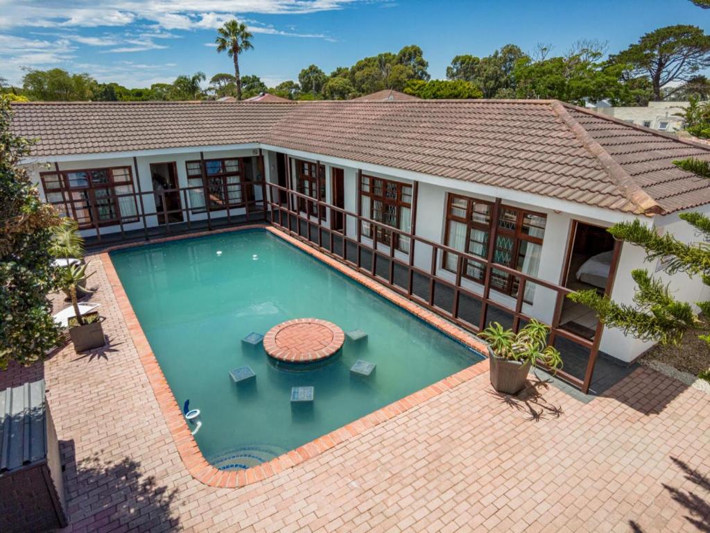 an overhead view of a swimming pool in a house at 5 Third Avenue Guesthouse in Port Elizabeth