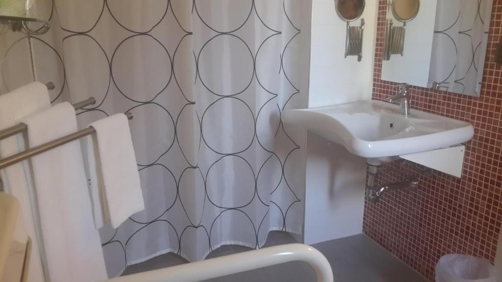 Koupelna v ubytování Hotel Miramare