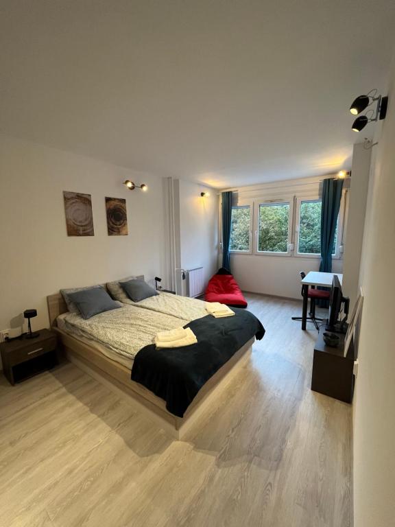 Posteľ alebo postele v izbe v ubytovaní Milad Apartman