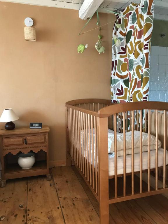 Postel nebo postele na pokoji v ubytování « Le LoMa » Ancienne fermette