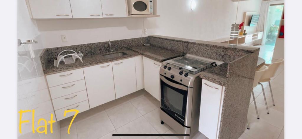 Η κουζίνα ή μικρή κουζίνα στο Piscinão do Cupe