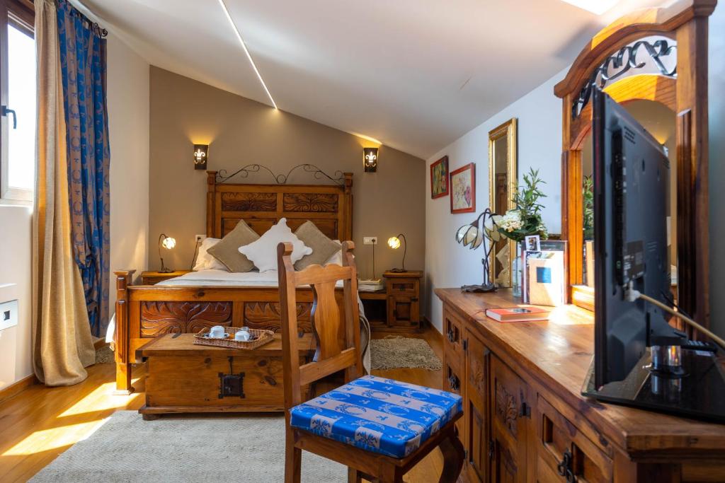 Postel nebo postele na pokoji v ubytování Posada de Eufrasio
