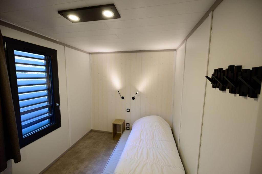 Postel nebo postele na pokoji v ubytování Le Clos de Barbey