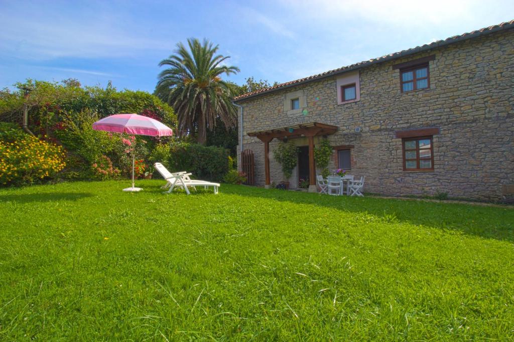 Κήπος έξω από το Apartamento La Ermita con jardín