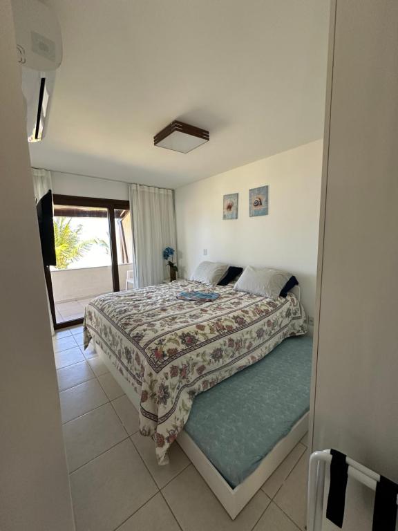Postel nebo postele na pokoji v ubytování Ekoara Residence bangalô 07