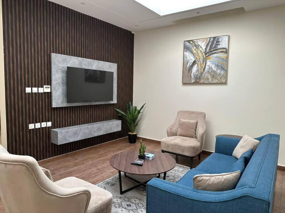 Et sittehjørne på Nuzul-R151 Elegant apartment