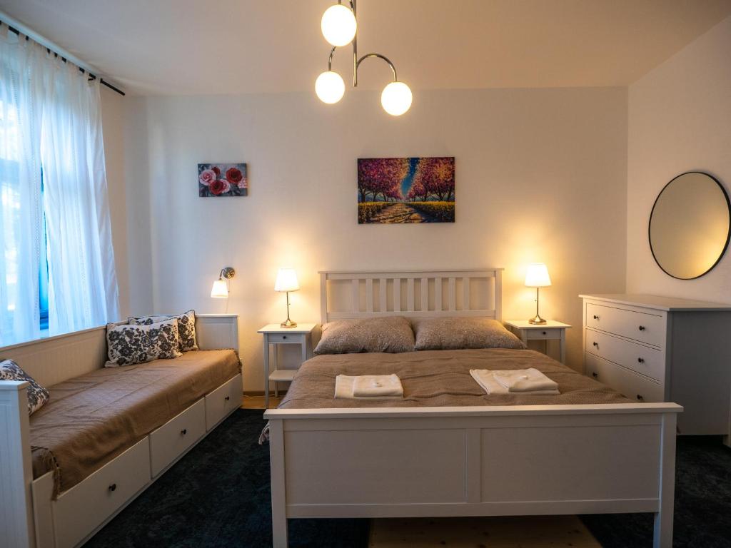 Postel nebo postele na pokoji v ubytování Penzión Záruby