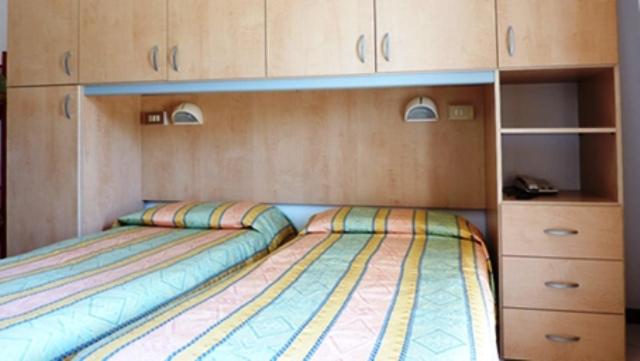 Postel nebo postele na pokoji v ubytování Hotel Canova