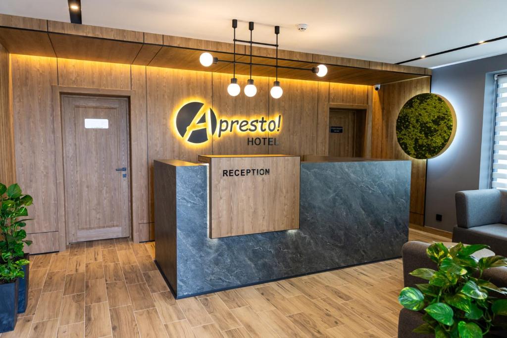 an office lobby with a reception counter with a argos hotel at A presto in Vinnytsya