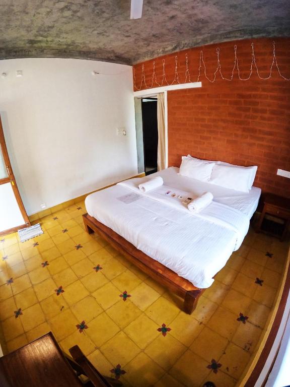Postel nebo postele na pokoji v ubytování Wow Farm House