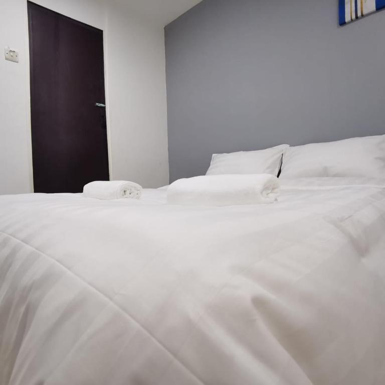 Postel nebo postele na pokoji v ubytování Hotel Seroja