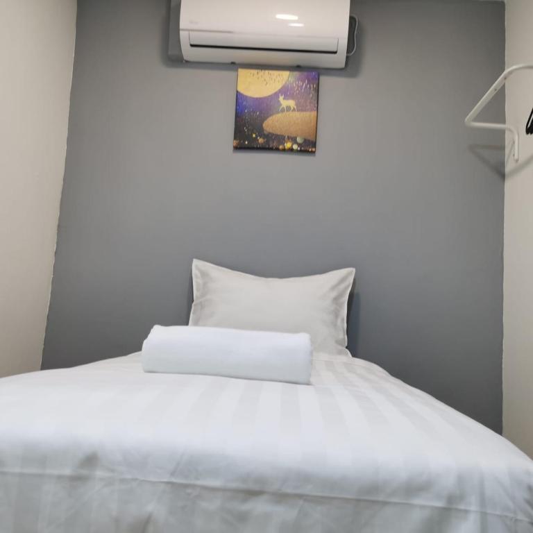 Postel nebo postele na pokoji v ubytování Hotel Seroja
