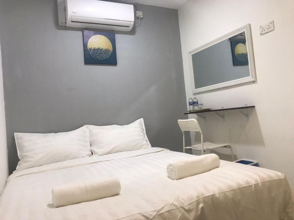 Ένα ή περισσότερα κρεβάτια σε δωμάτιο στο Hotel Seroja