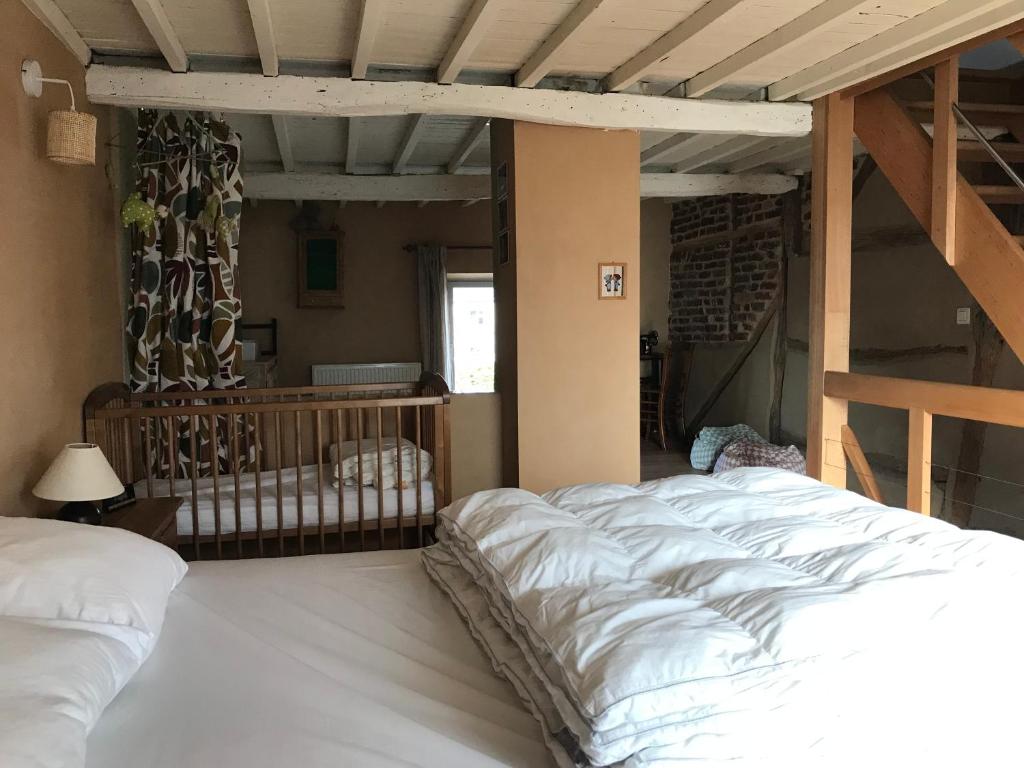 Postel nebo postele na pokoji v ubytování « Le LoMa » Ancienne fermette