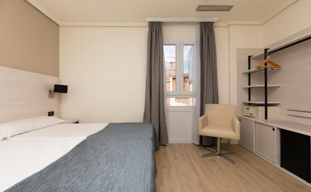 Cama o camas de una habitación en Porcel Ganivet