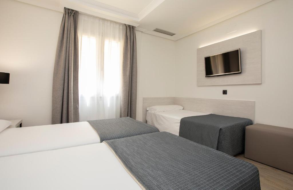 Cama o camas de una habitación en Porcel Ganivet