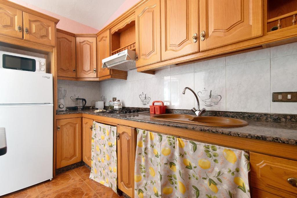 Kuchyň nebo kuchyňský kout v ubytování Vivienda v Torres 2