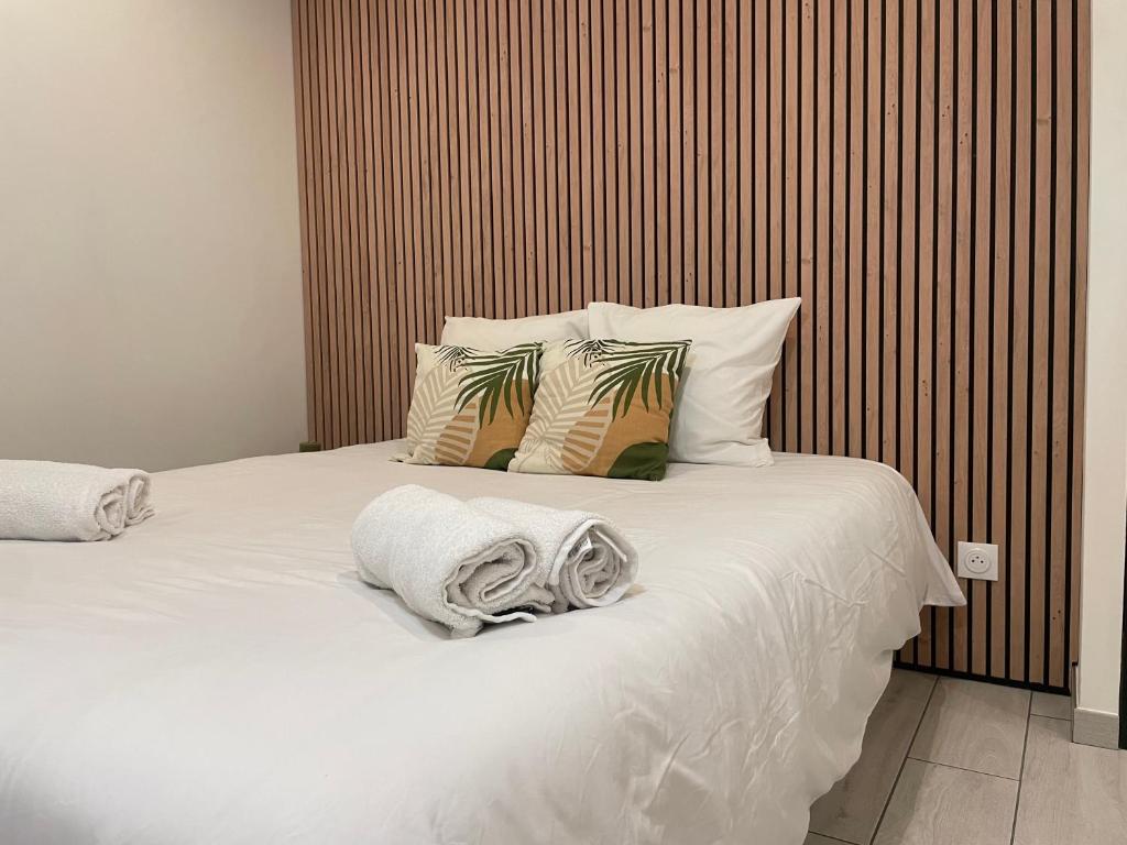 Postel nebo postele na pokoji v ubytování Appartement avec jacuzzi