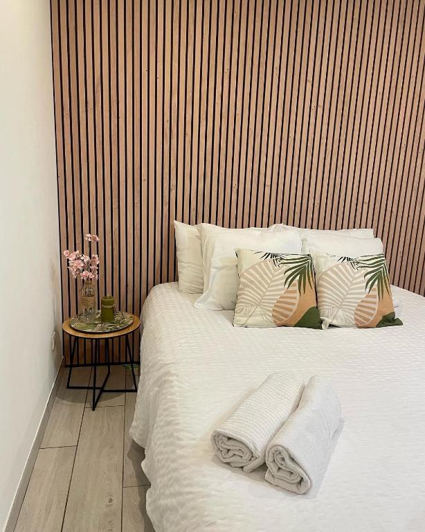 Postel nebo postele na pokoji v ubytování Appartement avec jacuzzi