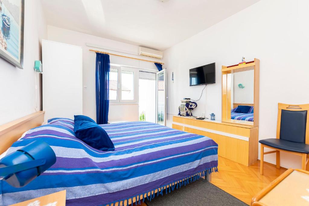Posteľ alebo postele v izbe v ubytovaní Apartment Two Sisters